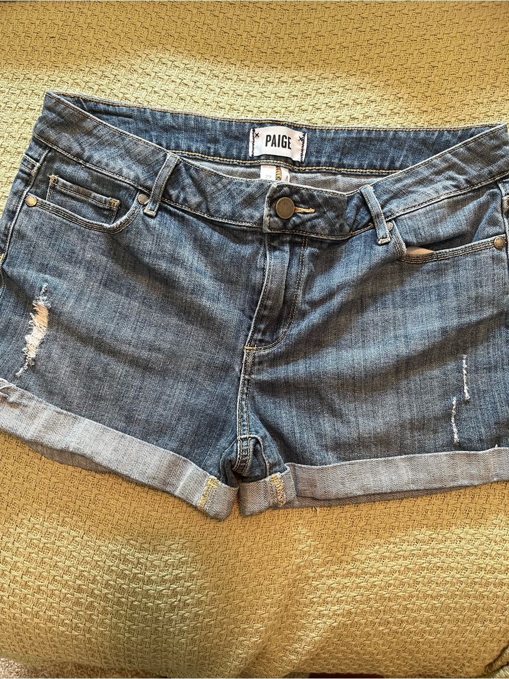 PAIGE Medium Blue Distressed Roll-Cuff Denim Shorts